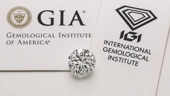 Lab-grown diamond being checked against independent grading documentation.